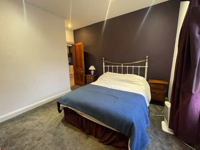 King-size bedroom in Strathcanaird Apartment